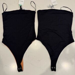(Bundle) Two Reversible Strapless Thong Bodysuits: Black/Tan + Black/White : M